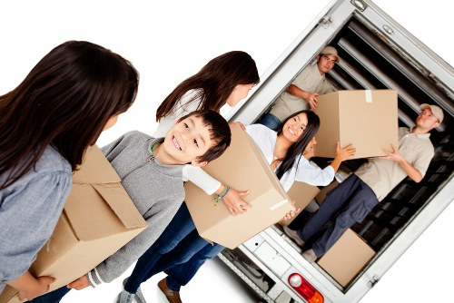 Removal team working with boxes and furniture in Waterloo