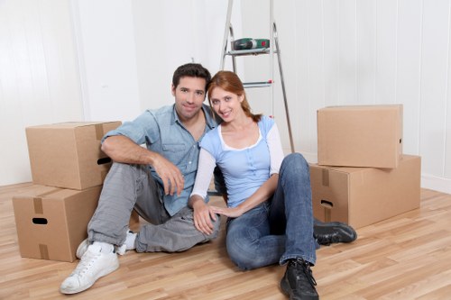 Professional movers carrying furniture in Waterloo