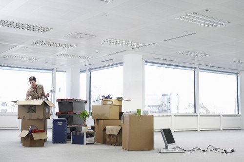 Staff assessing moving conditions before loading van