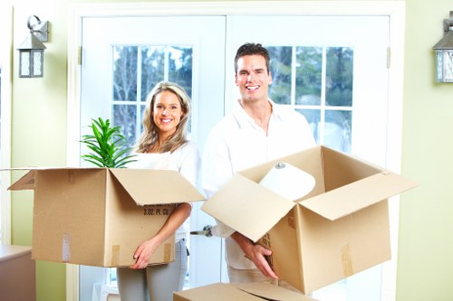 Packed office equipment and furniture ready for transport